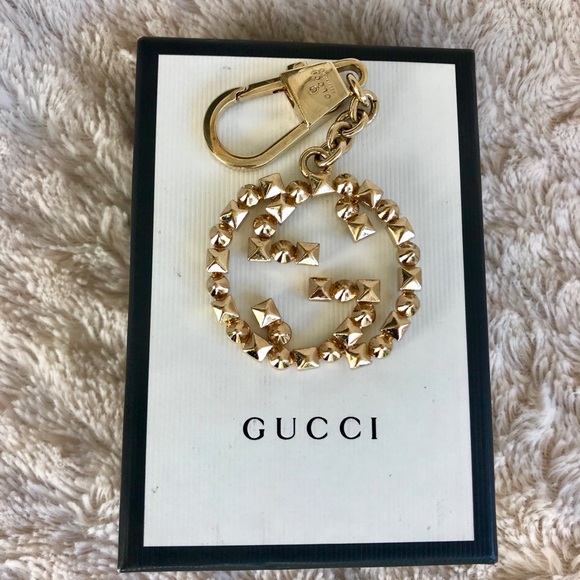 Gucci Accessories - Gucci charm brass.